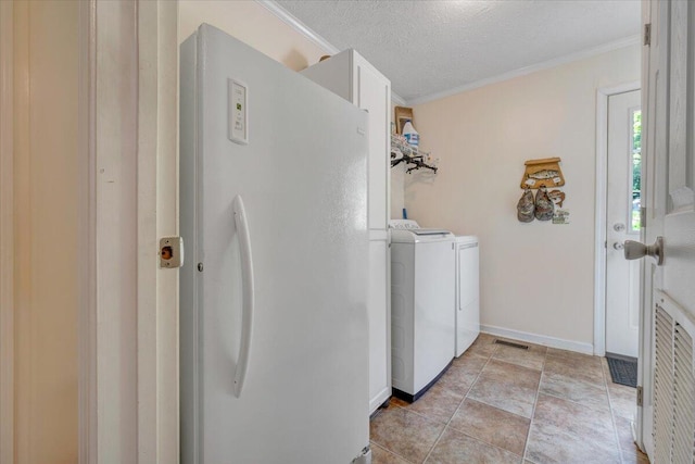 384 White Oak Ln, New Castle, VA 24127 - washroom with washer and clothes dryer, crown molding, baseboards, and a textured ceiling