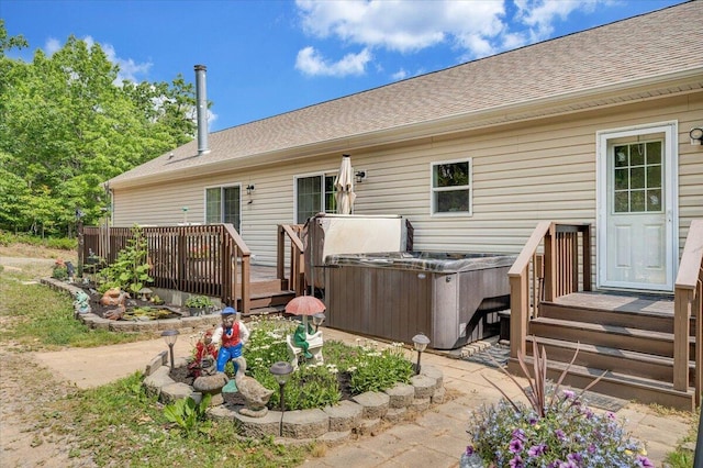 384 White Oak Ln, New Castle, VA 24127 - back of property with a hot tub, a wooden deck, and roof with shingles