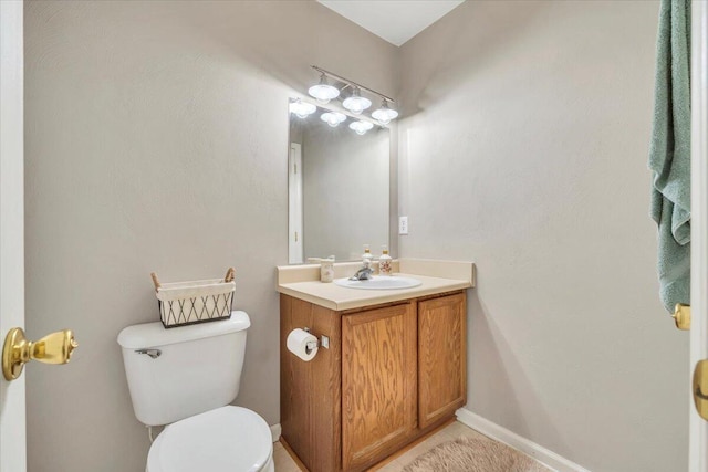 6119 Carolina Trl, Roanoke, VA 24019 - half bathroom featuring toilet, vanity, and baseboards