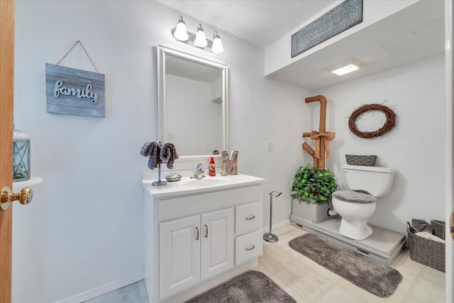 6119 Carolina Trl, Roanoke, VA 24019 - bathroom featuring vanity, toilet, and baseboards