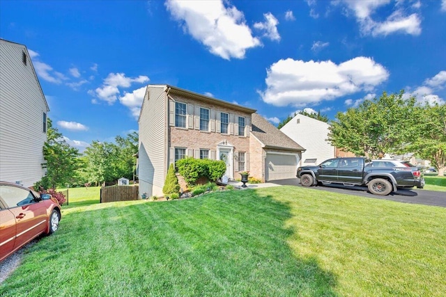 6119 Carolina Trl, Roanoke, VA 24019 - colonial-style house featuring a garage, a front yard, and driveway