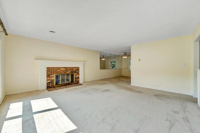 1207 Laymantown Rd, Troutville, VA 24175 - unfurnished living room featuring carpet floors, a brick fireplace, and baseboards