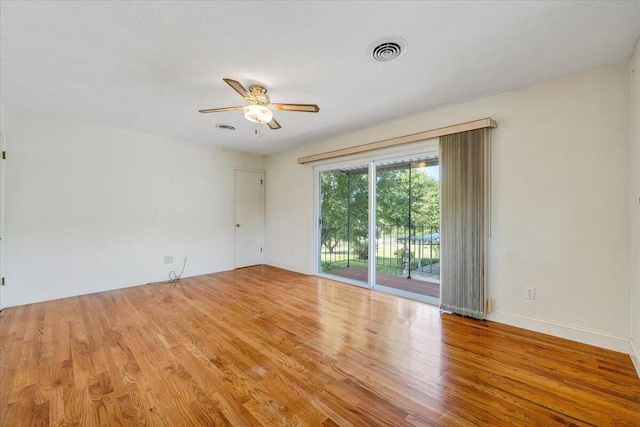 1207 Laymantown Rd, Troutville, VA 24175 - unfurnished room with ceiling fan, wood finished floors, and baseboards