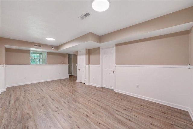 715 N Stonewall St, Salem, VA 24153 - below grade area featuring light wood finished floors and baseboards