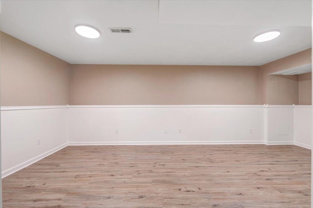 715 N Stonewall St, Salem, VA 24153 - spare room featuring wood finished floors and baseboards