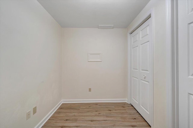 715 N Stonewall St, Salem, VA 24153 - unfurnished bedroom with light wood finished floors and a closet