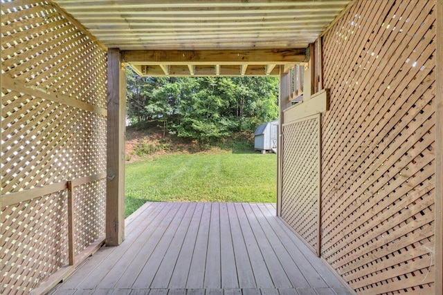 715 N Stonewall St, Salem, VA 24153 - wooden deck featuring a lawn and a storage shed