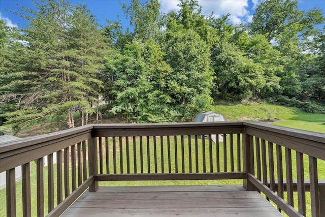 715 N Stonewall St, Salem, VA 24153 - wooden deck with a storage shed and a lawn