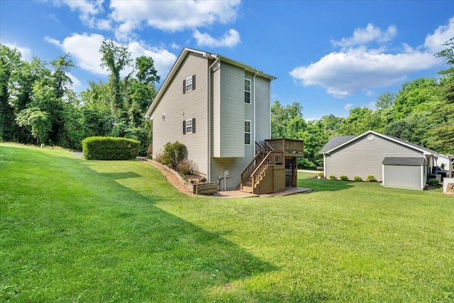 715 N Stonewall St, Salem, VA 24153 - rear view of house with stairway, a deck, a lawn, and a shed