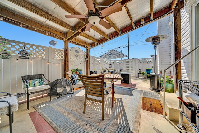 2139 Bailey Ave, Salem, VA 24153 - fenced backyard with outdoor dining area, ceiling fan, and a patio