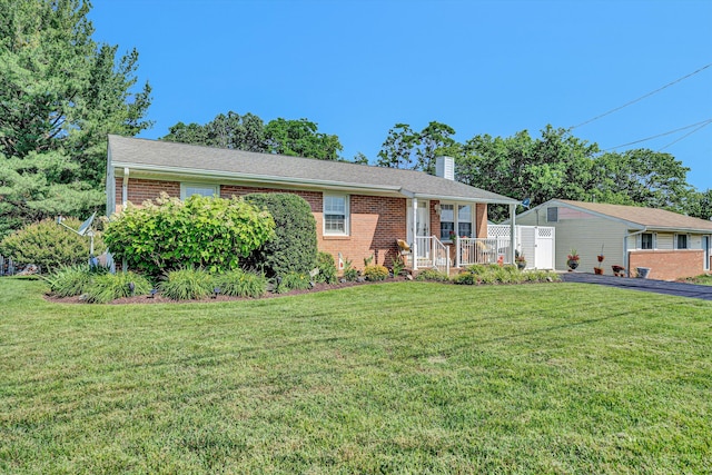 2139 Bailey Ave, Salem, VA 24153 - single story home with a chimney, brick siding, and a front lawn