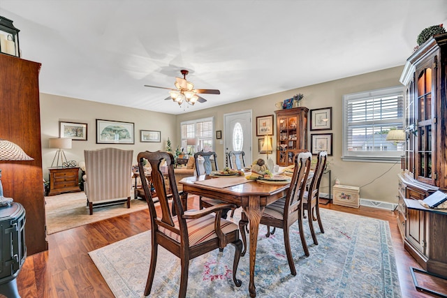 2139 Bailey Ave, Salem, VA 24153 - dining room featuring ceiling fan, wood finished floors, and baseboards