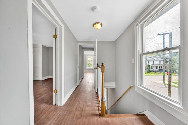 1002 Stewart Ave SE, Roanoke, VA 24013 - corridor with an upstairs landing, wood finished floors, and baseboards
