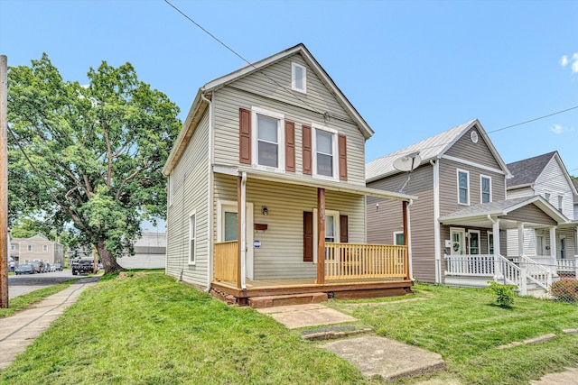 1002 Stewart Ave SE, Roanoke, VA 24013 - view of front of home featuring a porch and a front lawn