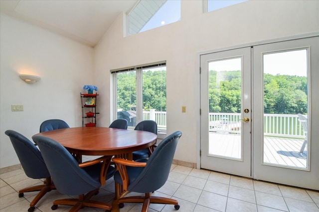 285 Dixon Dr, Hardy, VA 24101 - dining area with french doors, light tile patterned floors, high vaulted ceiling, and baseboards