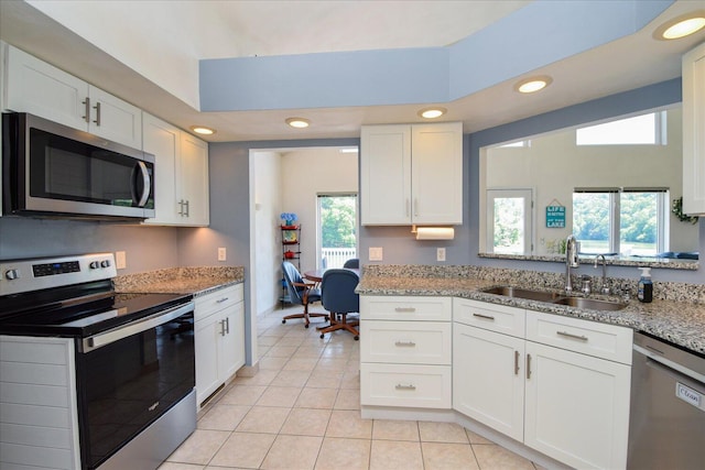 285 Dixon Dr, Hardy, VA 24101 - kitchen featuring stainless steel appliances, a sink, recessed lighting, white cabinets, and light tile patterned flooring
