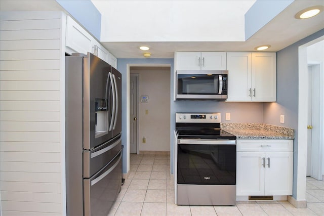 285 Dixon Dr, Hardy, VA 24101 - kitchen featuring appliances with stainless steel finishes, light tile patterned floors, white cabinetry, and recessed lighting