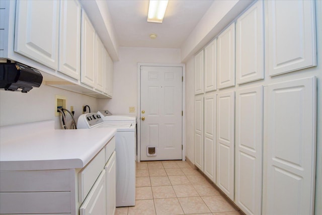 285 Dixon Dr, Hardy, VA 24101 - laundry area featuring cabinet space, washer and clothes dryer, and light tile patterned floors