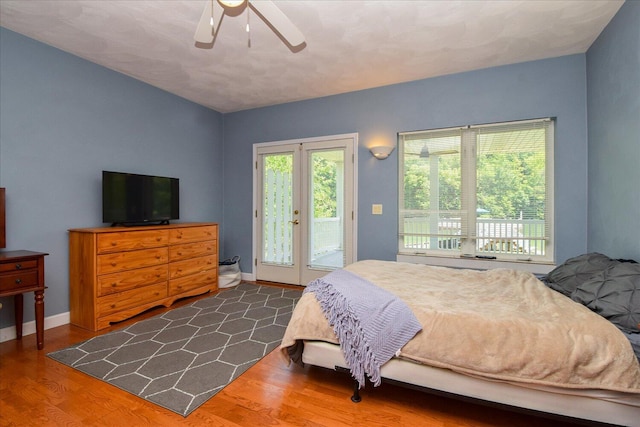 285 Dixon Dr, Hardy, VA 24101 - bedroom with access to outside, wood finished floors, a ceiling fan, and baseboards