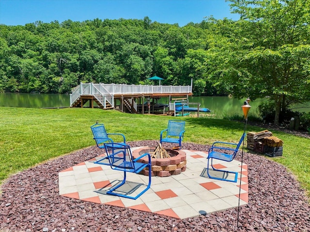 285 Dixon Dr, Hardy, VA 24101 - view of patio featuring a fire pit, stairway, a view of trees, and a water view