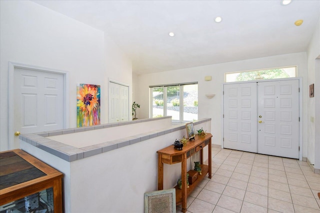 285 Dixon Dr, Hardy, VA 24101 - entryway with light tile patterned floors, recessed lighting, and lofted ceiling