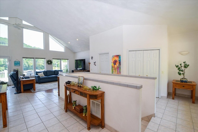285 Dixon Dr, Hardy, VA 24101 - living area featuring light tile patterned floors, ceiling fan, and high vaulted ceiling