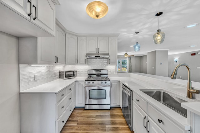 395 Middle Valley Rd, Hardy, VA 24101 - kitchen with stainless steel appliances, a sink, white cabinets, backsplash, and recessed lighting