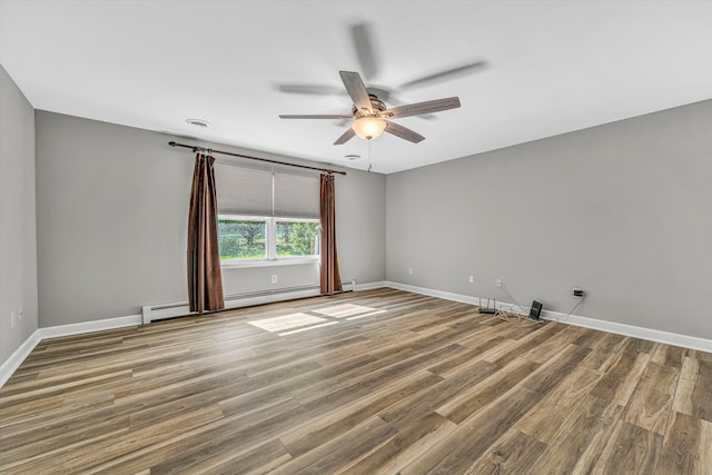 395 Middle Valley Rd, Hardy, VA 24101 - empty room featuring ceiling fan, baseboards, wood finished floors, and a baseboard heating unit
