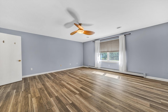 395 Middle Valley Rd, Hardy, VA 24101 - unfurnished room featuring baseboard heating, a ceiling fan, wood finished floors, and baseboards