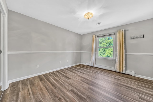 395 Middle Valley Rd, Hardy, VA 24101 - spare room with wood finished floors, baseboards, and baseboard heating