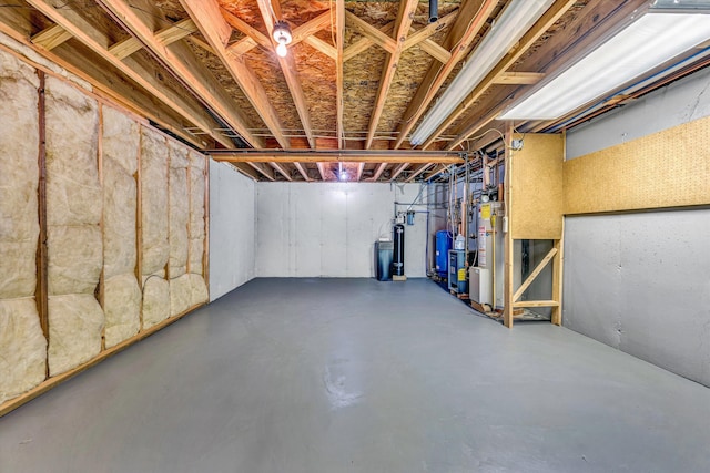 395 Middle Valley Rd, Hardy, VA 24101 - unfinished basement featuring a water pressure tank and gas water heater