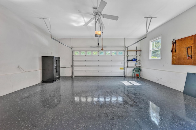 395 Middle Valley Rd, Hardy, VA 24101 - garage with black fridge with ice dispenser, ceiling fan, and a garage door opener