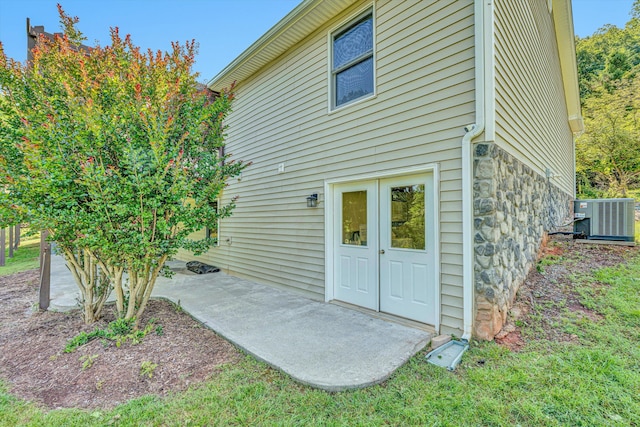 395 Middle Valley Rd, Hardy, VA 24101 - rear view of house with central AC and stone siding