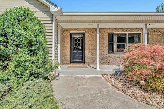 395 Middle Valley Rd, Hardy, VA 24101 - view of exterior entry featuring covered porch and brick siding