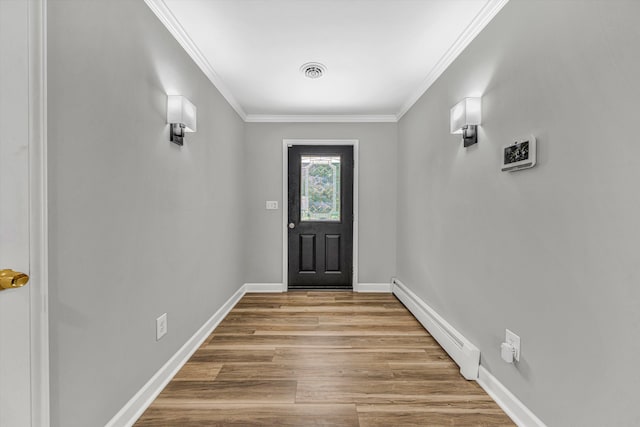 395 Middle Valley Rd, Hardy, VA 24101 - entryway featuring a baseboard heating unit, ornamental molding, wood finished floors, and baseboards