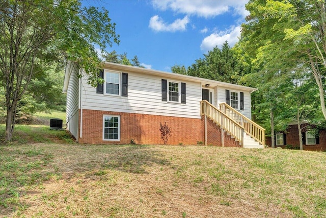 1632 Haymakertown Rd, Troutville, VA 24175 - ranch-style home featuring cooling unit, brick siding, and a front yard