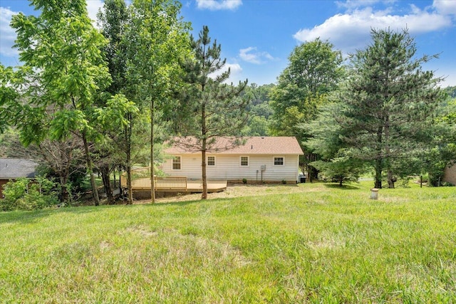 1632 Haymakertown Rd, Troutville, VA 24175 - view of green lawn with a wooden deck