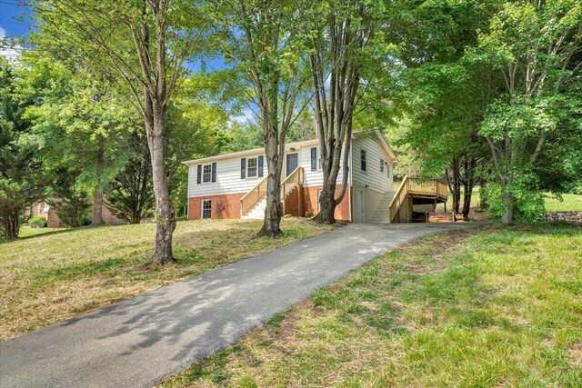 1632 Haymakertown Rd, Troutville, VA 24175 - ranch-style house with stairway, a front lawn, and asphalt driveway