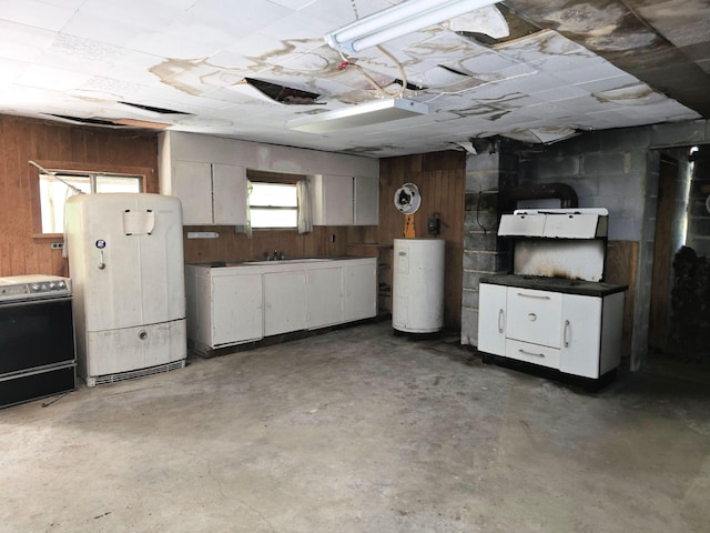 115 Wrights Branch Rd, New Castle, VA 24127 - garage with refrigerator, water heater, and wood walls