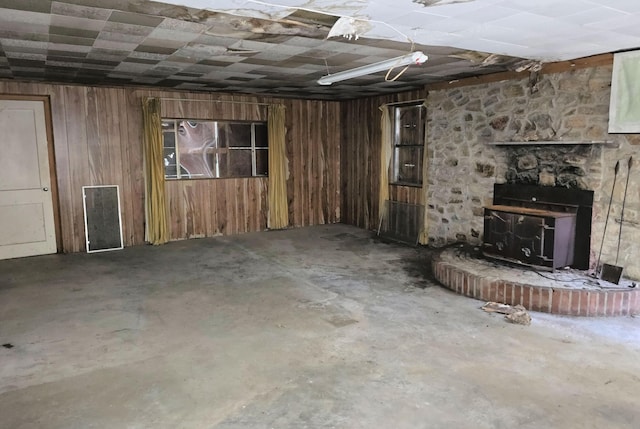 115 Wrights Branch Rd, New Castle, VA 24127 - below grade area with wood walls and a wood stove