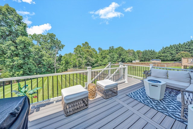6131 Carolina Trl, Roanoke, VA 24019 - wooden deck featuring a yard, an outdoor living space with a fire pit, and a view of trees