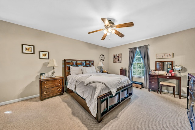 6131 Carolina Trl, Roanoke, VA 24019 - bedroom with light colored carpet, baseboards, and ceiling fan