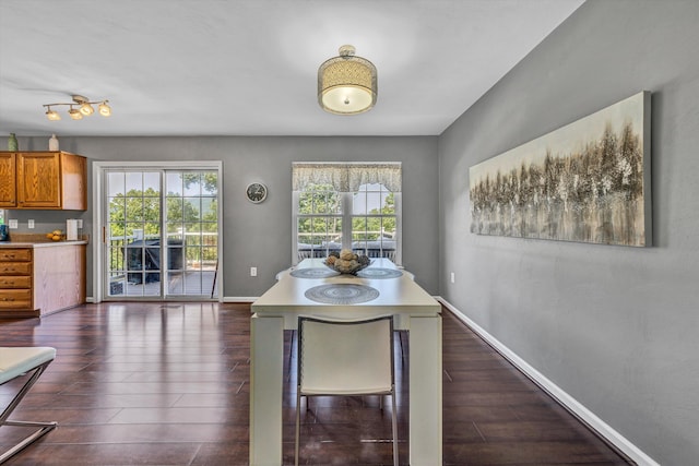 6131 Carolina Trl, Roanoke, VA 24019 - dining space with baseboards and dark wood-style floors