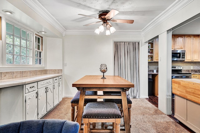 5260 Crossbow Cir Unit 9E, Roanoke, VA 24018 - dining room featuring a ceiling fan, crown molding, and light carpet