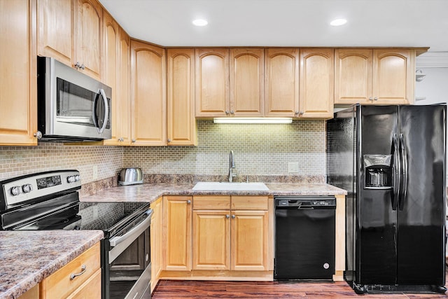 5260 Crossbow Cir Unit 9E, Roanoke, VA 24018 - kitchen with black appliances, a sink, light brown cabinets, and recessed lighting