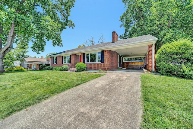 2527 Northminster Rd NW, Roanoke, VA 24012 - single story home featuring concrete driveway, a chimney, brick siding, and a front yard