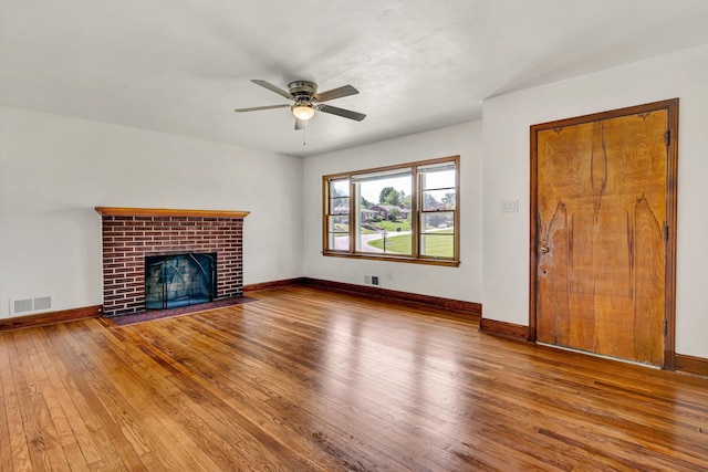 2527 Northminster Rd NW, Roanoke, VA 24012 - unfurnished living room featuring hardwood / wood-style floors, a ceiling fan, and baseboards
