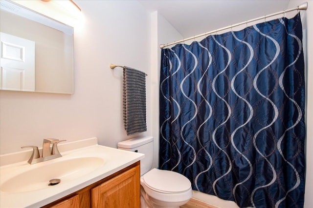 1903 Archbold Ave NE, Roanoke, VA 24012 - bathroom with toilet, vanity, and a shower with shower curtain