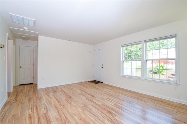 1903 Archbold Ave NE, Roanoke, VA 24012 - empty room with light wood-style floors and baseboards