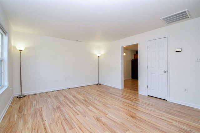 1903 Archbold Ave NE, Roanoke, VA 24012 - empty room with light wood-style floors and baseboards